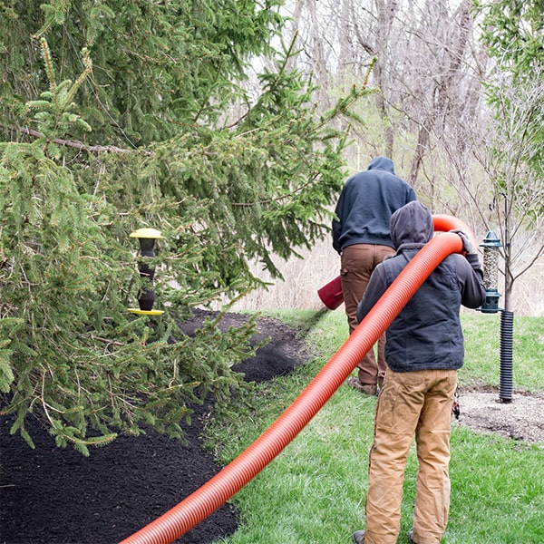 mulch blowing can tackle difficult terrain and areas that are challenging to reach by hand